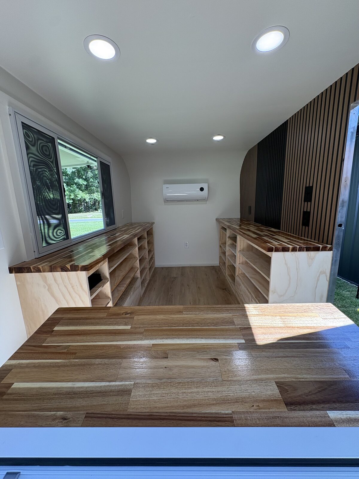 Interior counters and pass-through window inside the Black Barn Bakery trailer
